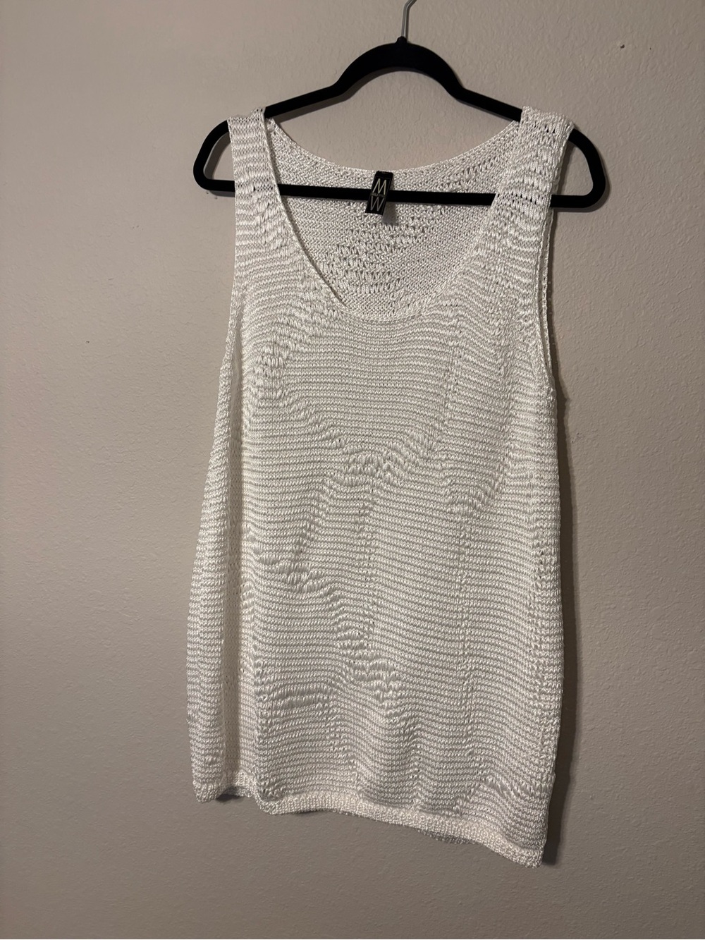 Sleeveless open weave top